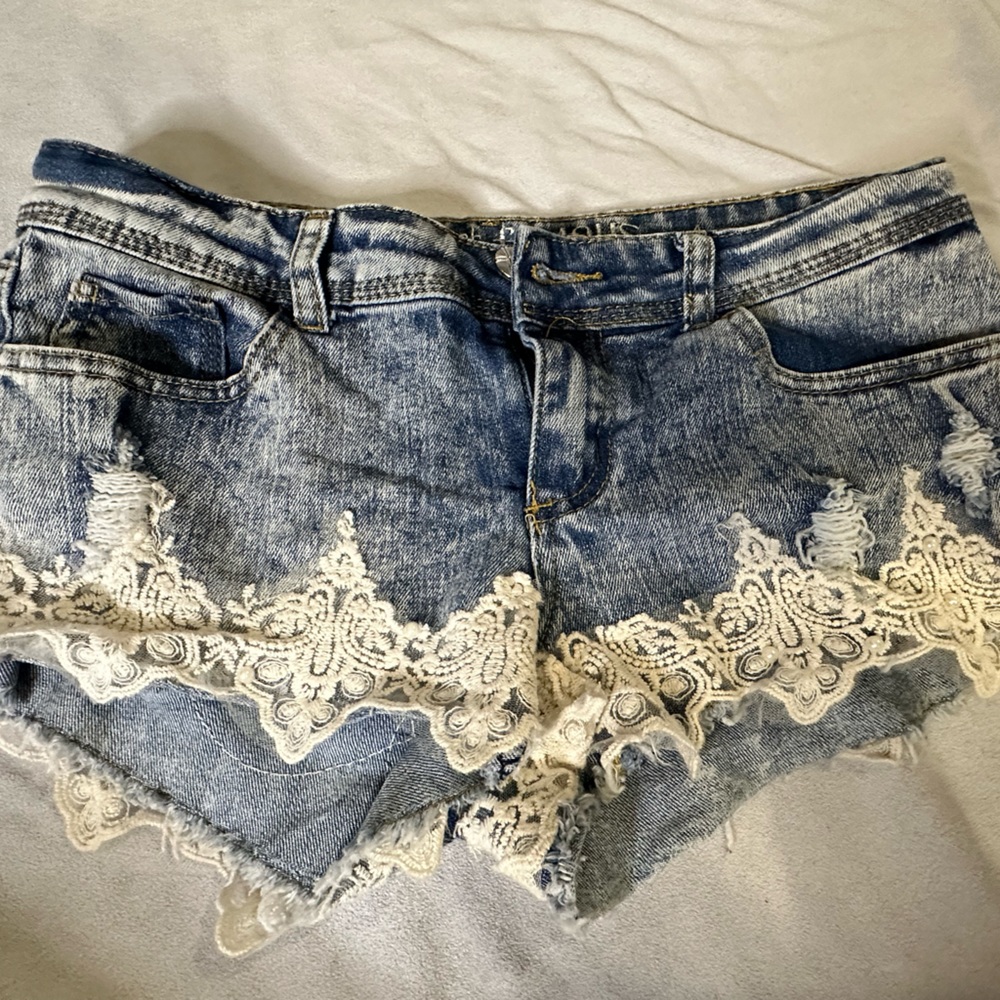 Almost Famous distressed denim jean shorts w: lace & pearl accents. Super cute